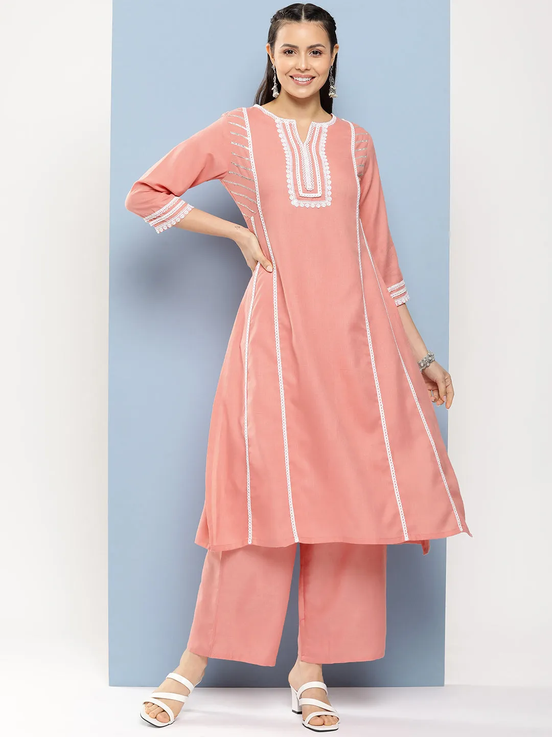 Peach Solid Lace Details Kurta With Peach Solid Palazzo.